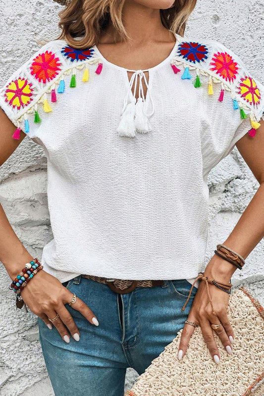 Tassel Top: White Short Sleeve Blouse with Embroidered Detail